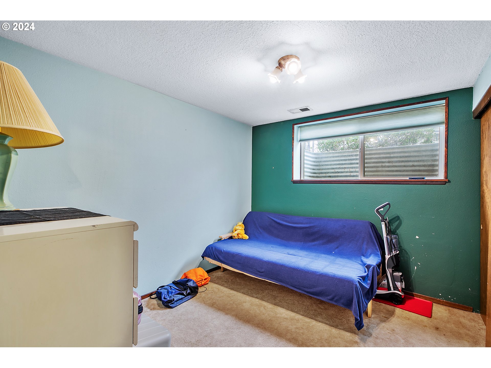 321 Northeast Scott Drive Gresham, OR 97030 - Photo 34 of 48 a room with furniture and a window