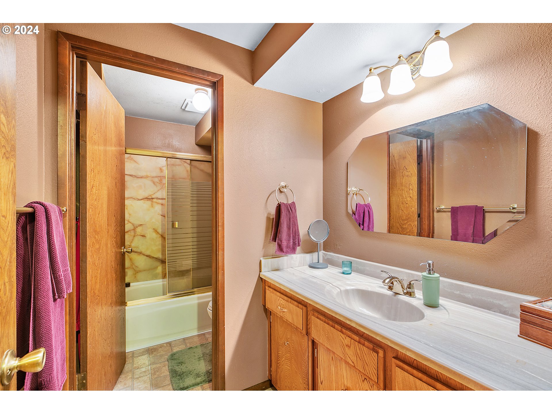 321 Northeast Scott Drive Gresham, OR 97030 - Photo 37 of 48 a bathroom with a sink vanity and a mirror