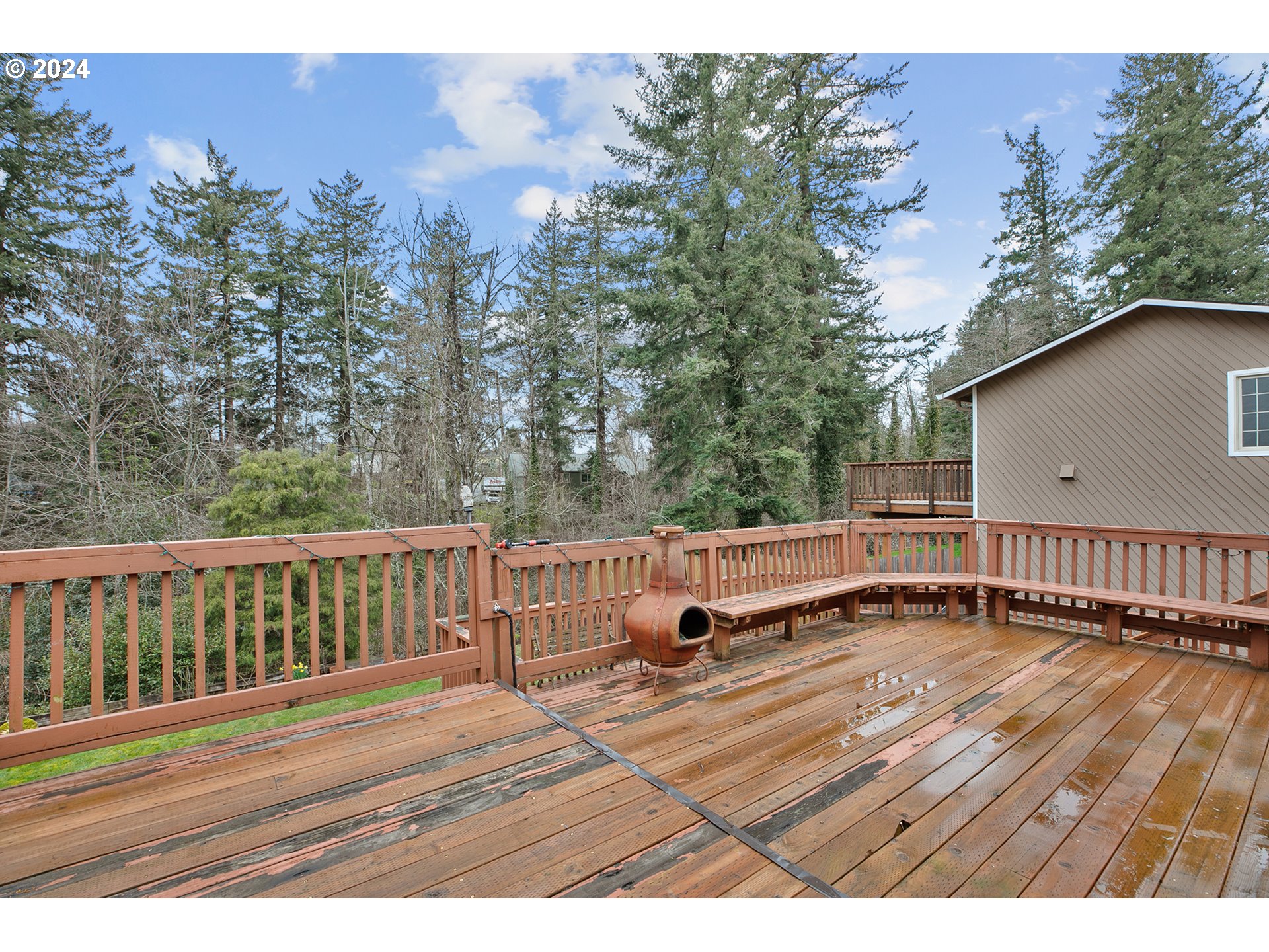 321 Northeast Scott Drive Gresham, OR 97030 - Photo 39 of 48 a view of balcony with wooden floor and fence