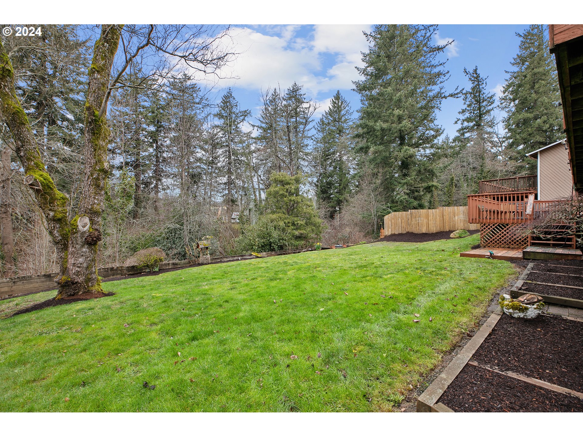 321 Northeast Scott Drive Gresham, OR 97030 - Photo 45 of 48 a view of a backyard with a garden