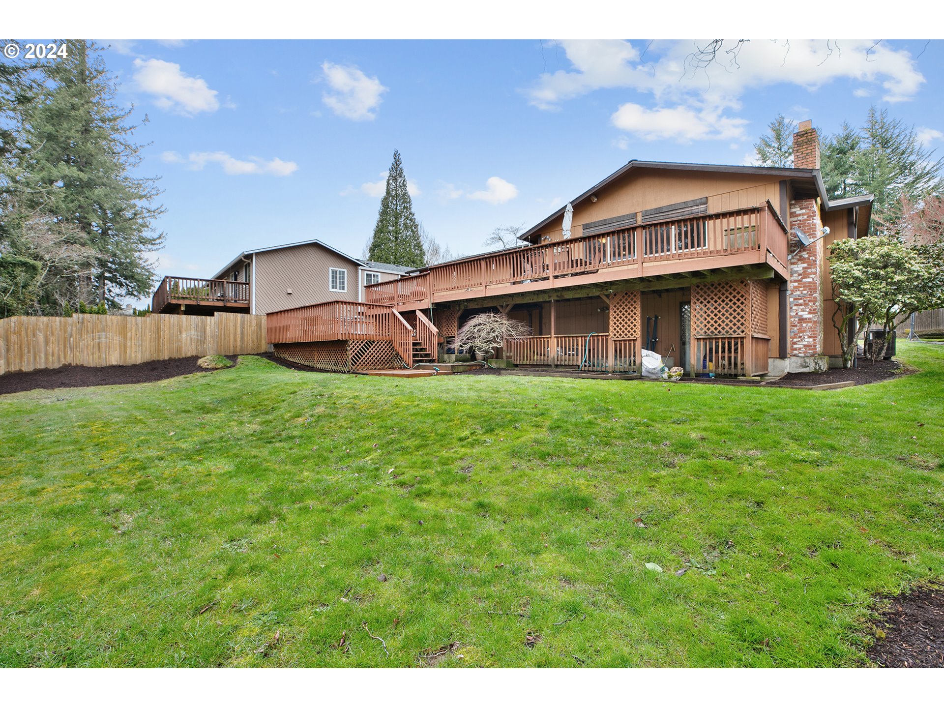 321 Northeast Scott Drive Gresham, OR 97030 - Photo 46 of 48 a view of a house with a big yard and large trees