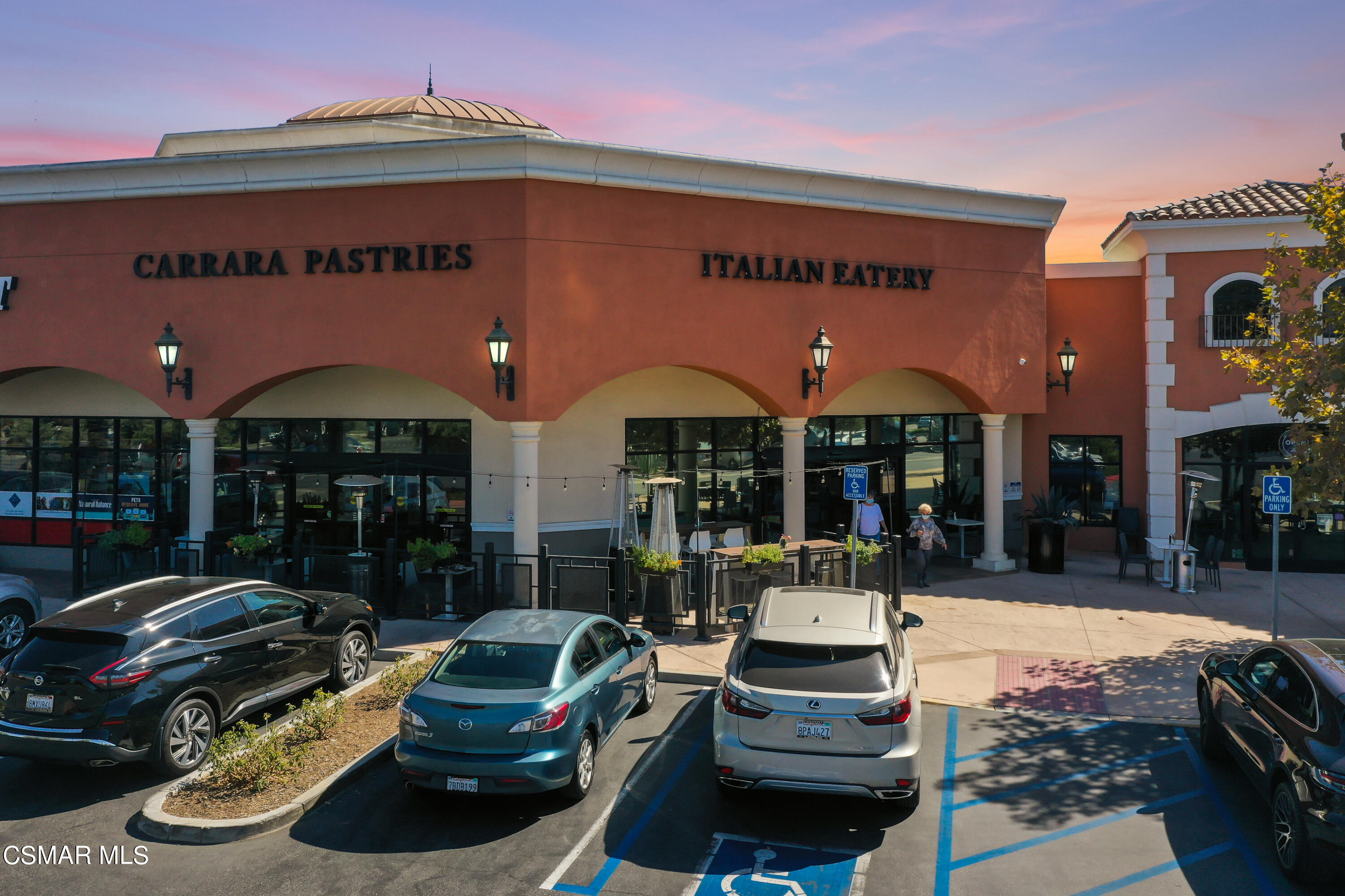 1179 Walnut Canyon Road Moorpark, CA 93021 - Photo 11 of 30 a front view of a building with parking