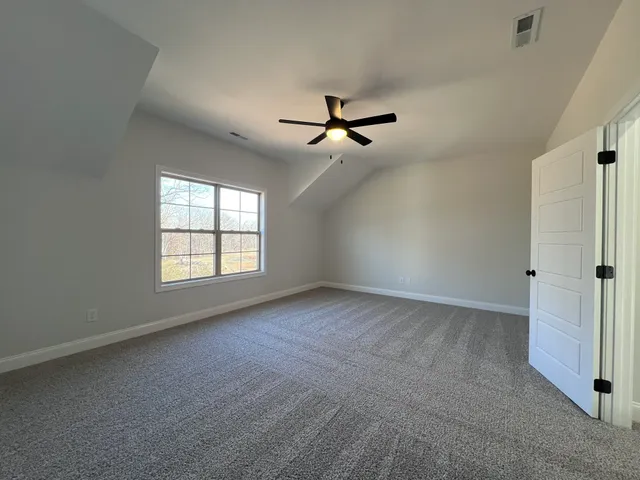 a living room with furniture couches and a fireplace