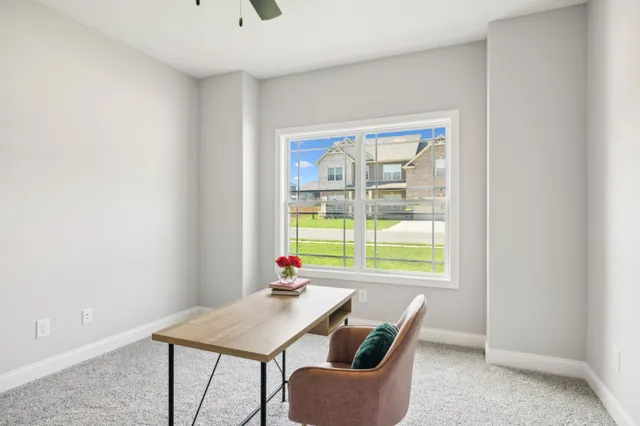 a bedroom with a bed and dresser