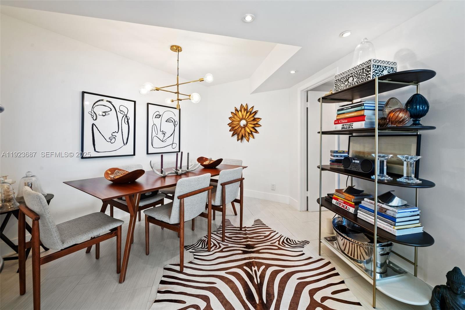 20185 East Country Club Drive, Unit 904 Aventura, FL 33180 - Photo 13 of 29 a dining room with furniture and window