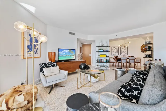 a living room with furniture and a couch