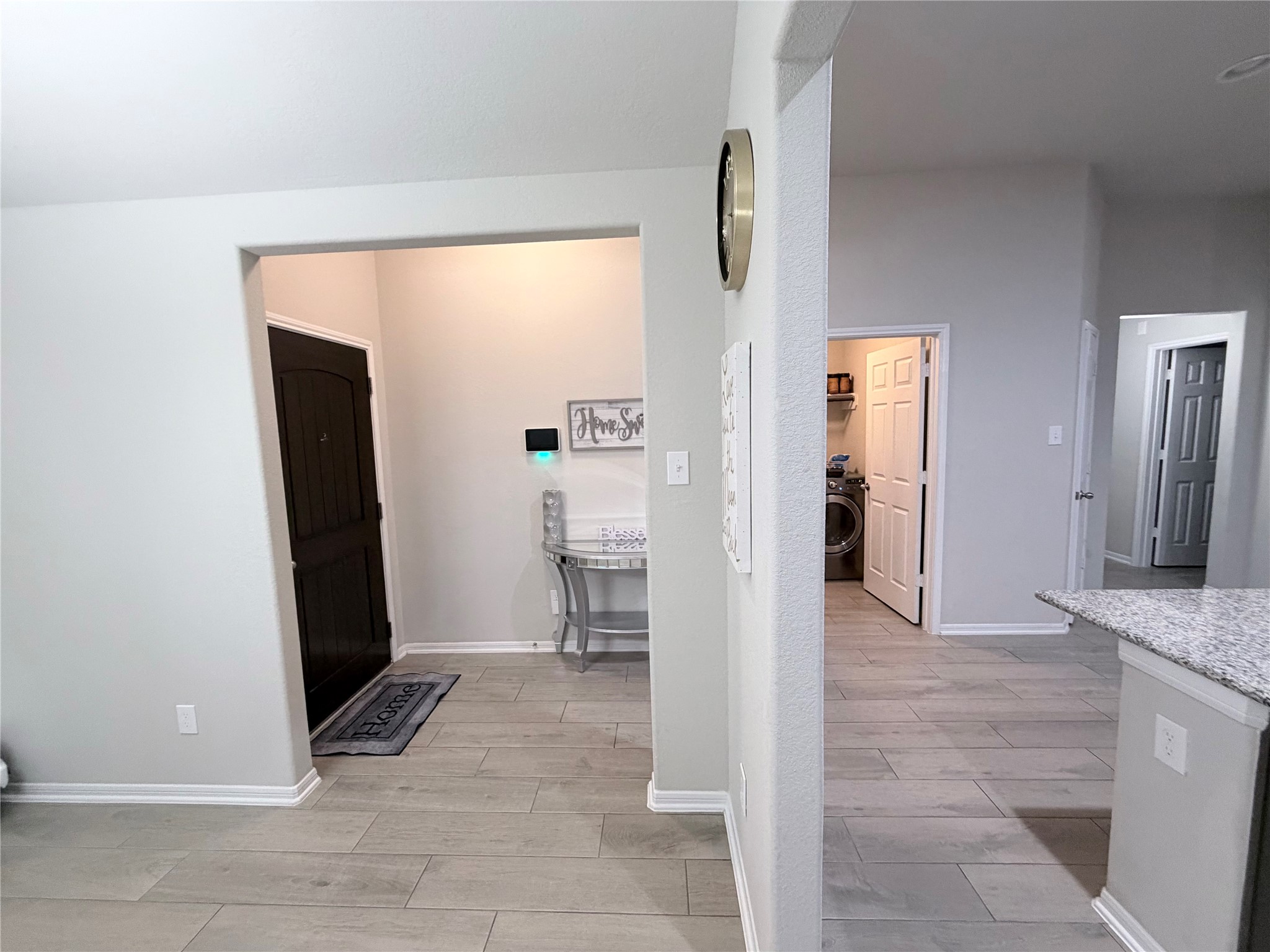 4303 Greeley Lane Rosenberg, TX 77471 - Photo 18 of 30 a view of a hallway with bathroom and a sink