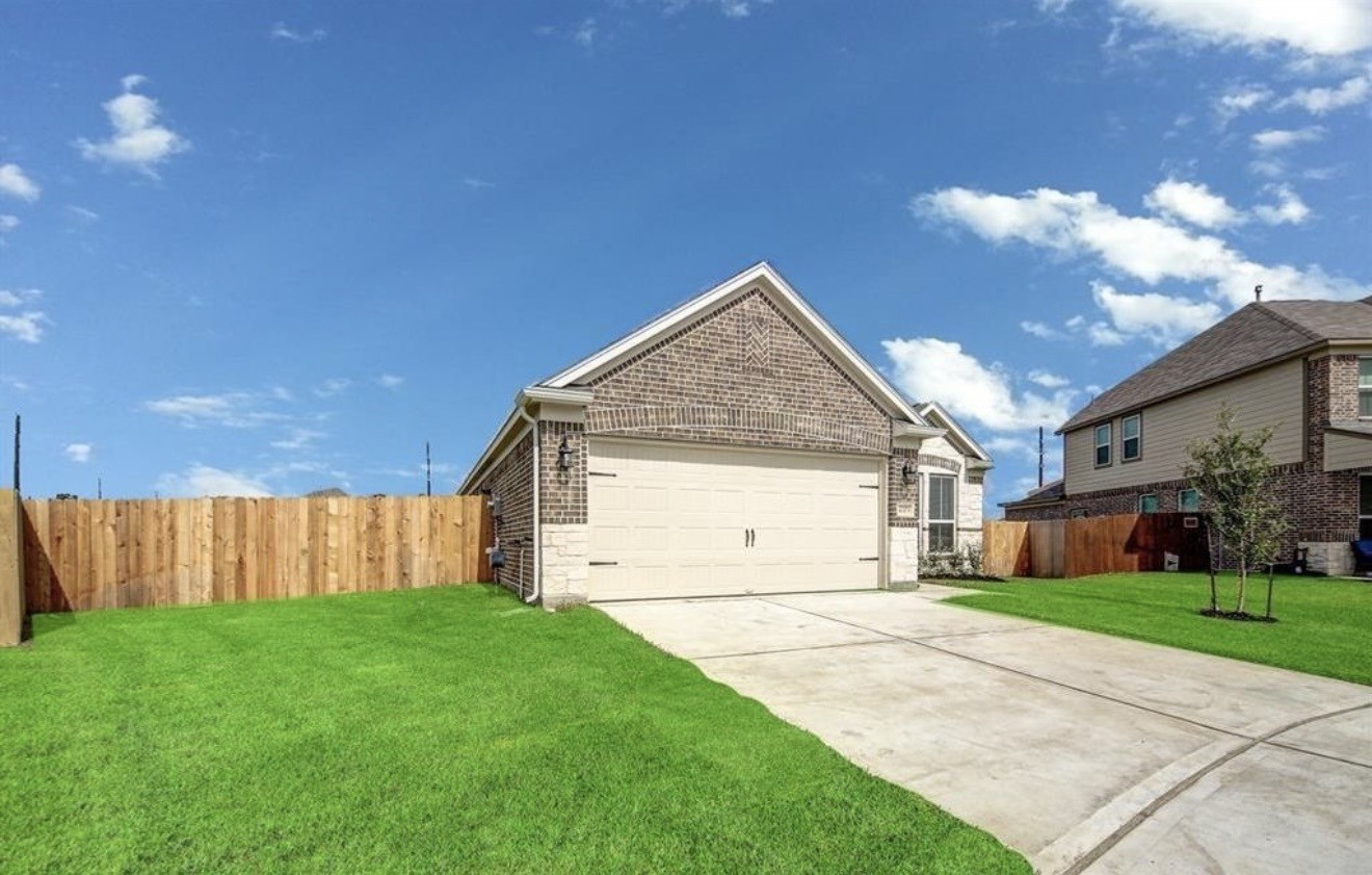 4303 Greeley Lane Rosenberg, TX 77471 - Photo 2 of 30 a view of a house with a yard