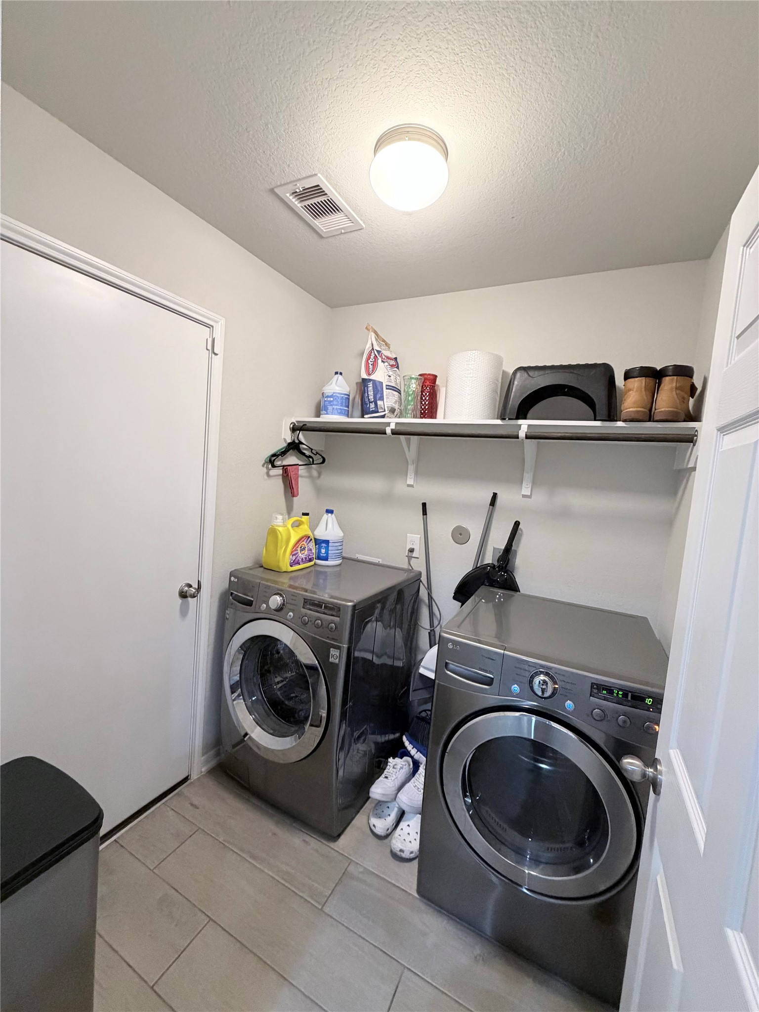 4303 Greeley Lane Rosenberg, TX 77471 - Photo 29 of 30 a utility room with dryer and washer