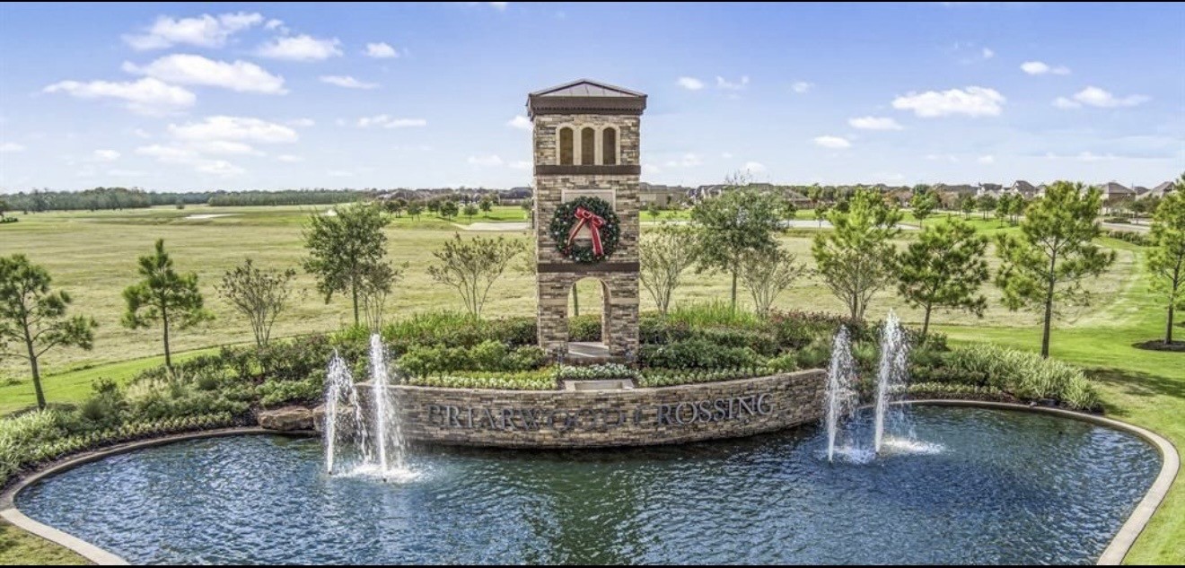 4303 Greeley Lane Rosenberg, TX 77471 - Photo 3 of 30 a front view of a house with a yard and lake view
