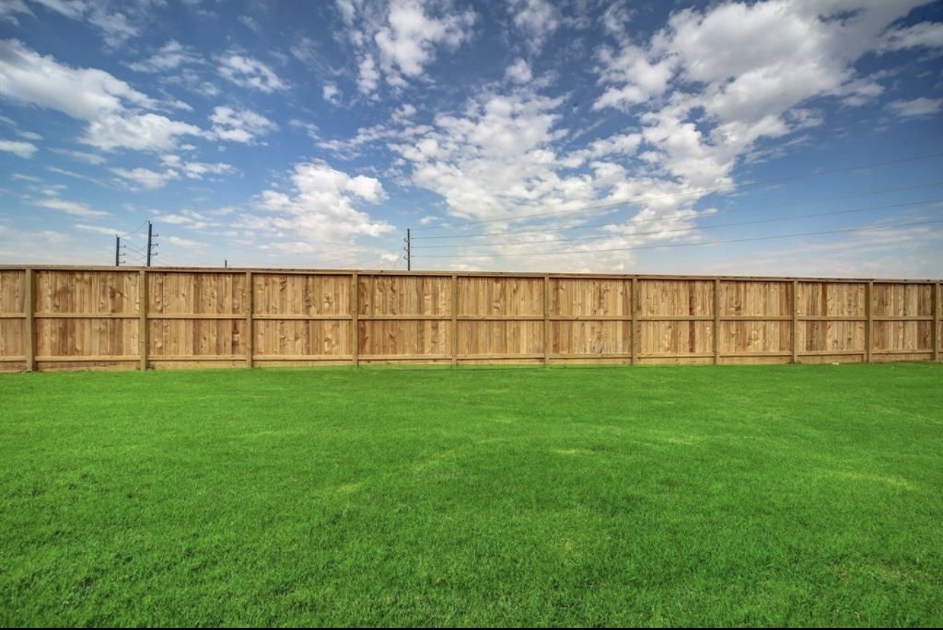 4303 Greeley Lane Rosenberg, TX 77471 - Photo 4 of 30 a view of a yard with a fence