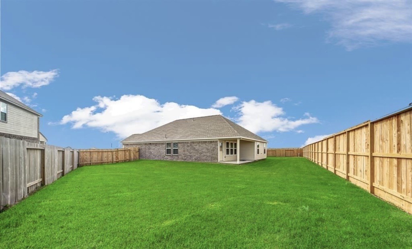 4303 Greeley Lane Rosenberg, TX 77471 - Photo 6 of 30 a view of a house with a yard and a porch