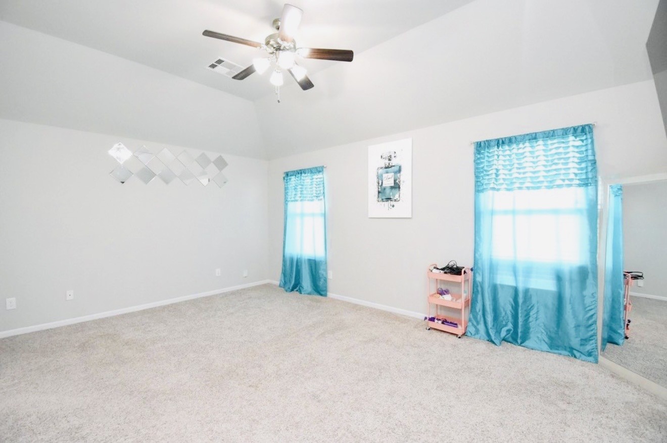 4303 Greeley Lane Rosenberg, TX 77471 - Photo 7 of 30 a view of an empty room with a window