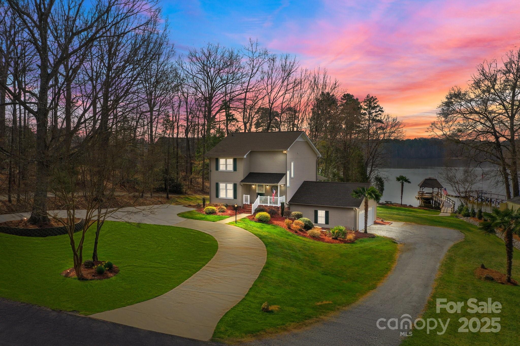 520 Mainsail Road Salisbury, NC 28146 - Photo 1 of 47 a view of a house with backyard sitting area and garden