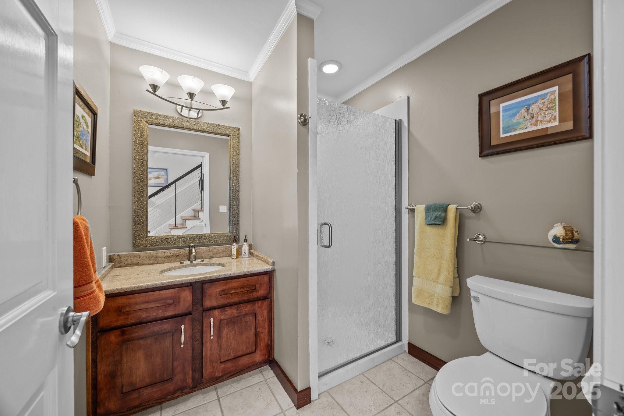 520 Mainsail Road Salisbury, NC 28146 - Photo 17 of 47 a bathroom with a sink a toilet and a mirror