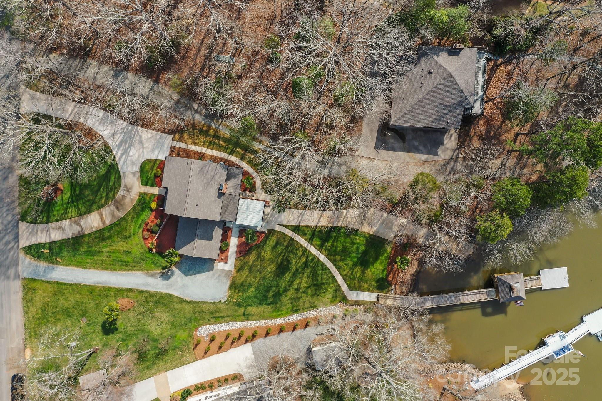 520 Mainsail Road Salisbury, NC 28146 - Photo 31 of 47 an aerial view of a house with a yard and lake view