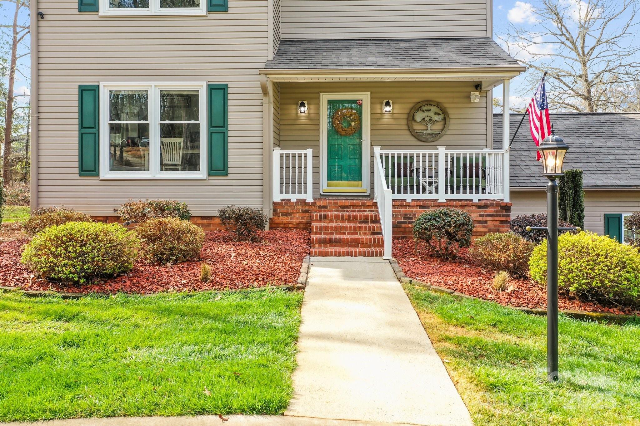 520 Mainsail Road Salisbury, NC 28146 - Photo 40 of 47 a front view of a house with garden