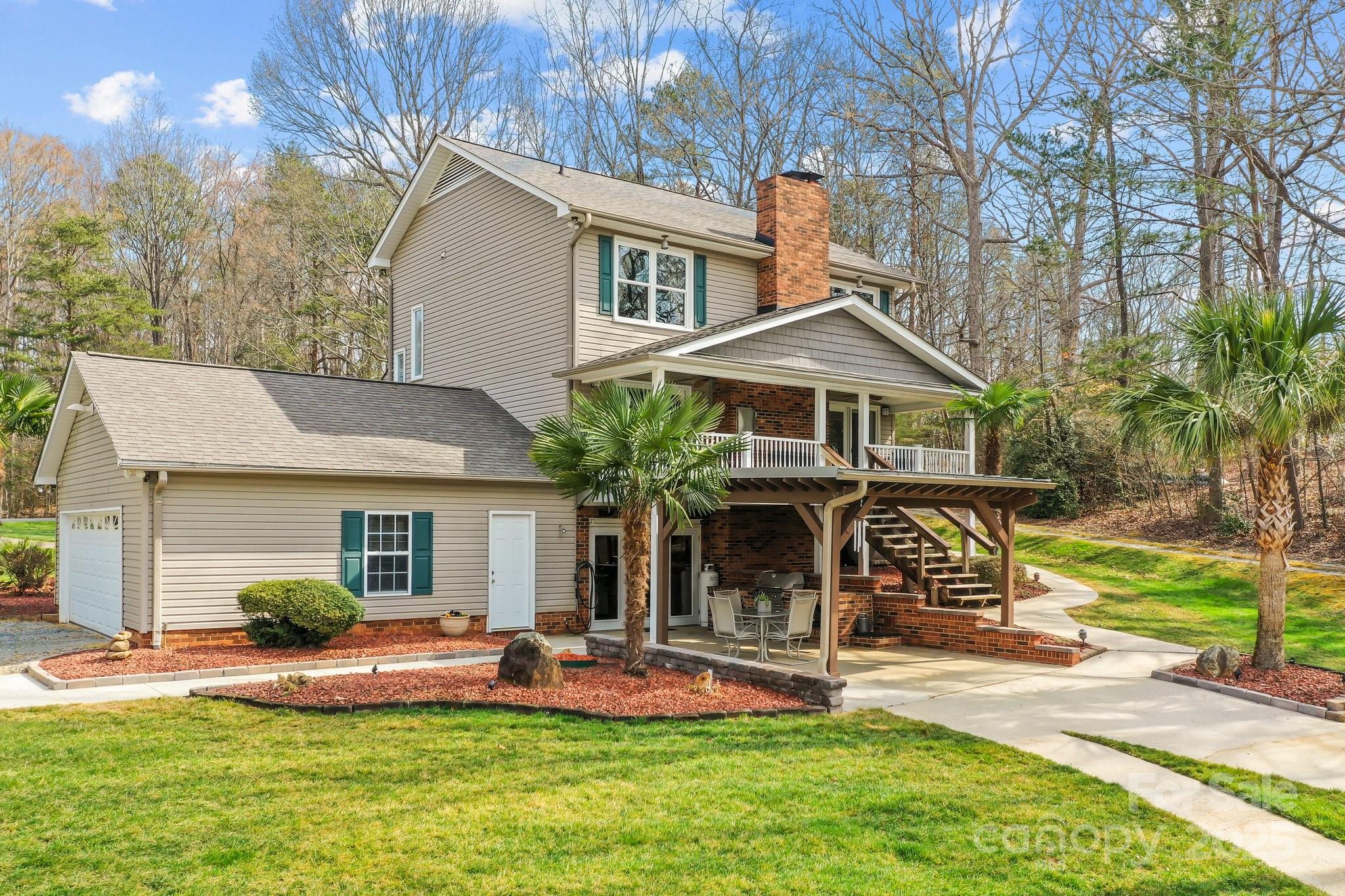 520 Mainsail Road Salisbury, NC 28146 - Photo 44 of 47 a front view of house with yard and outdoor seating