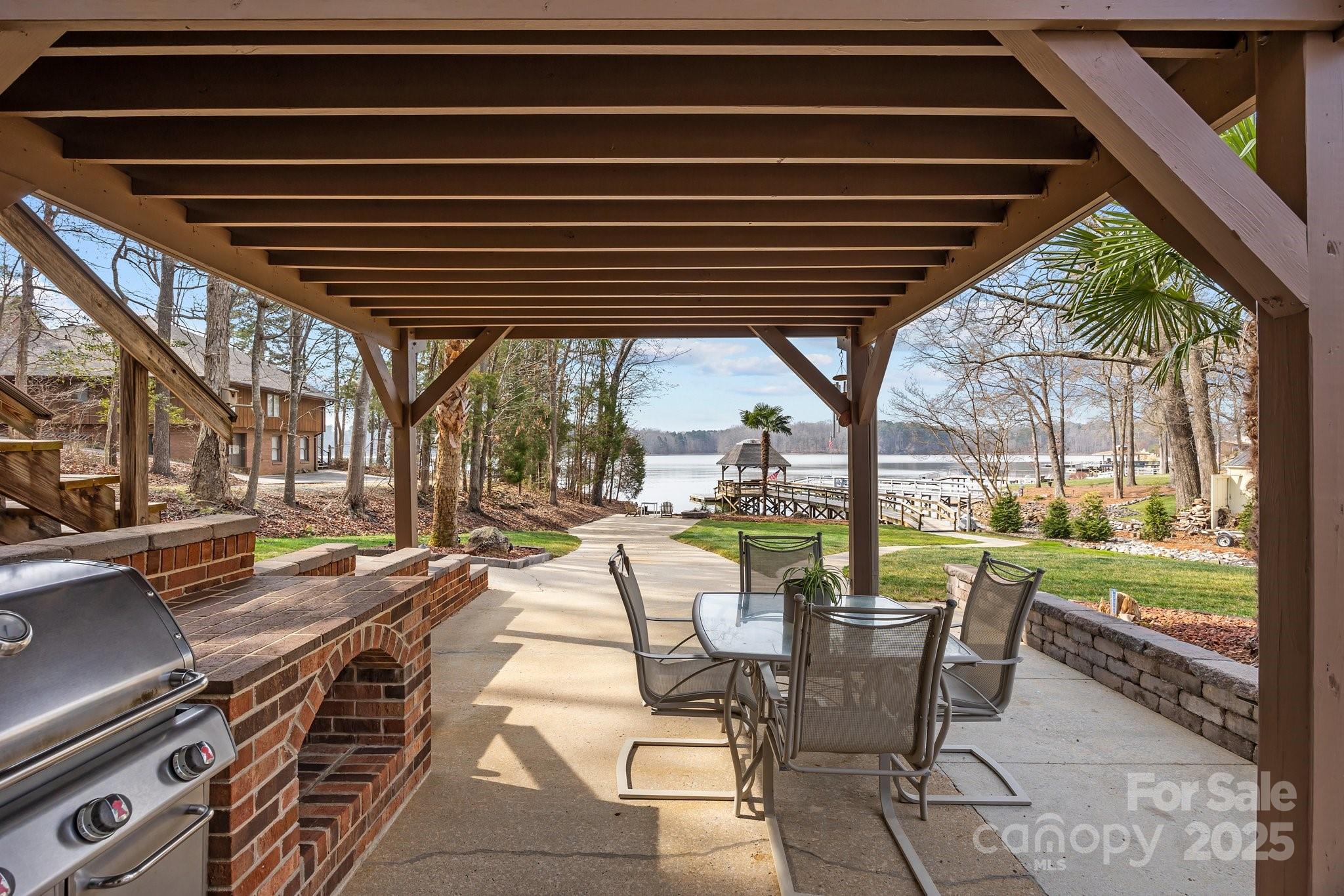 520 Mainsail Road Salisbury, NC 28146 - Photo 47 of 47 a view of a patio with swimming pool table and chairs