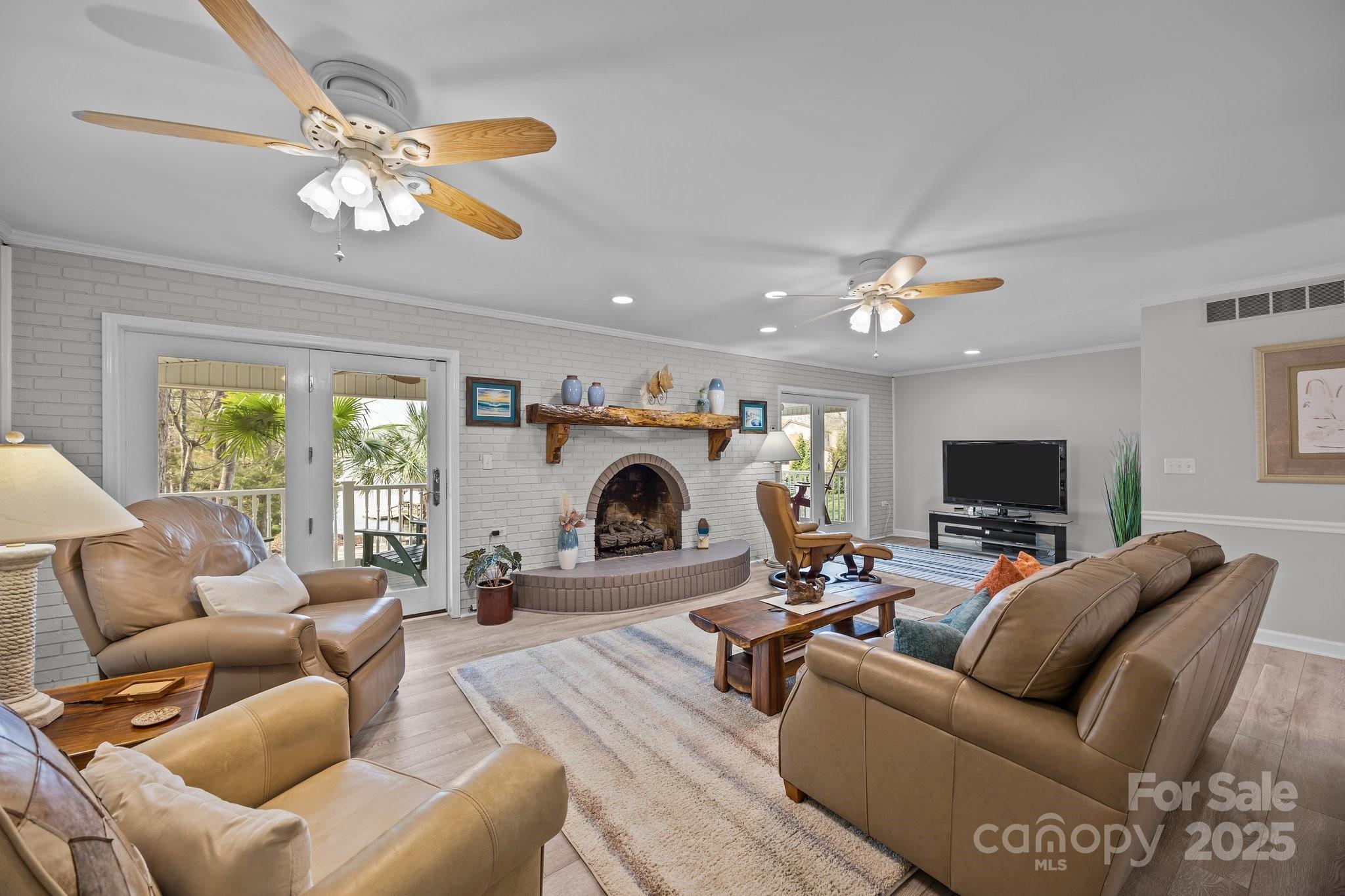 520 Mainsail Road Salisbury, NC 28146 - Photo 8 of 47 a living room with furniture and a flat screen tv