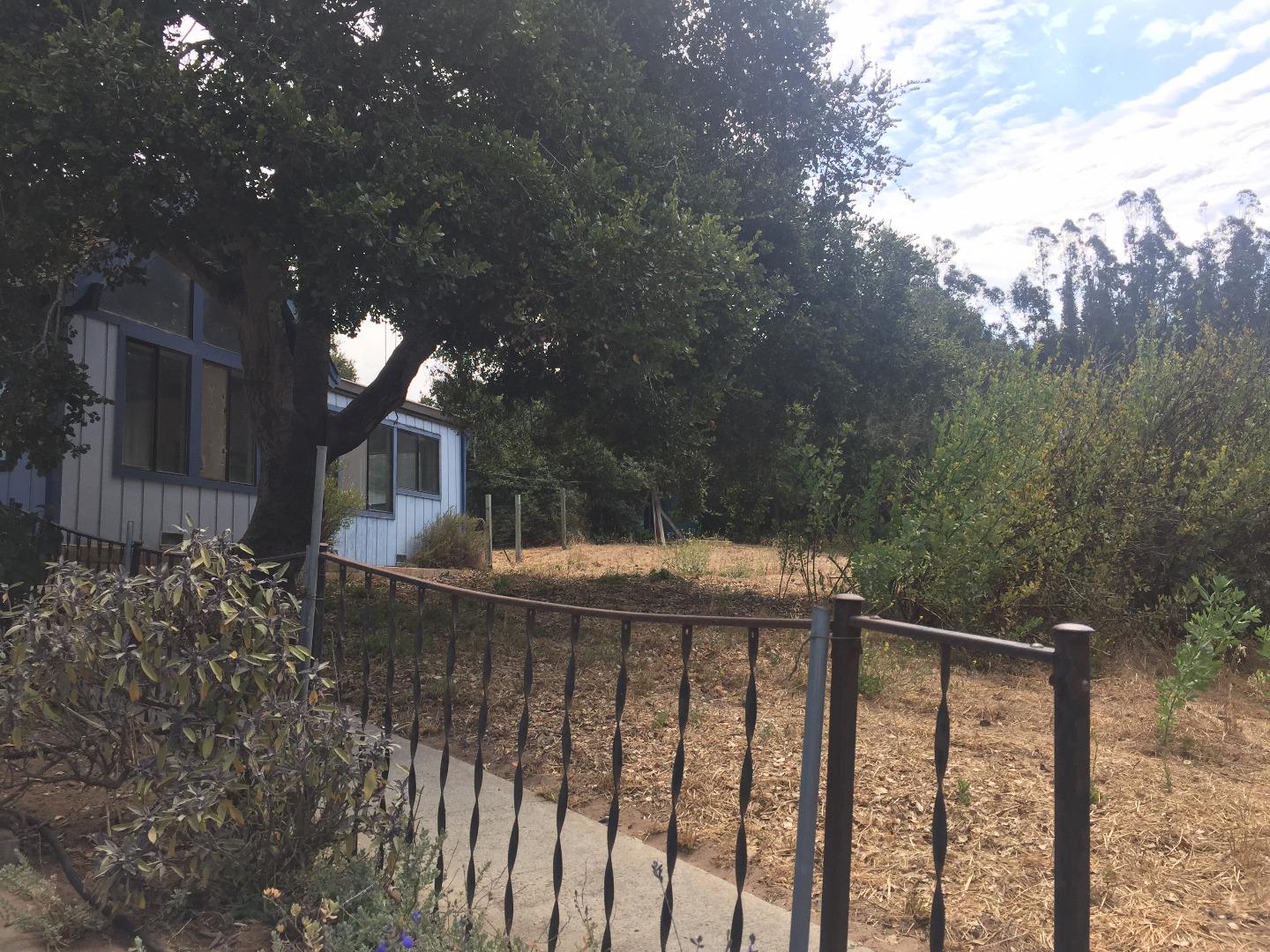 392 Vega Road Watsonville, CA 95076 - Photo 38 of 38 a view of a house with a wooden fence