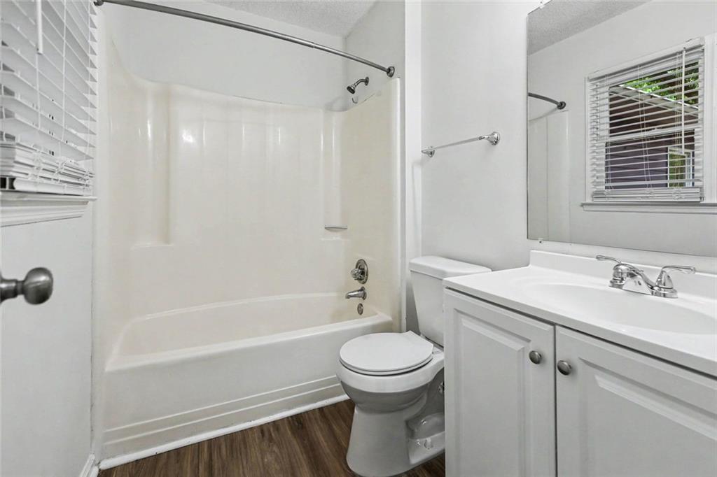 19 Thomas Way Newnan, GA 30263 - Photo 13 of 15 a bathroom with a sink toilet and shower