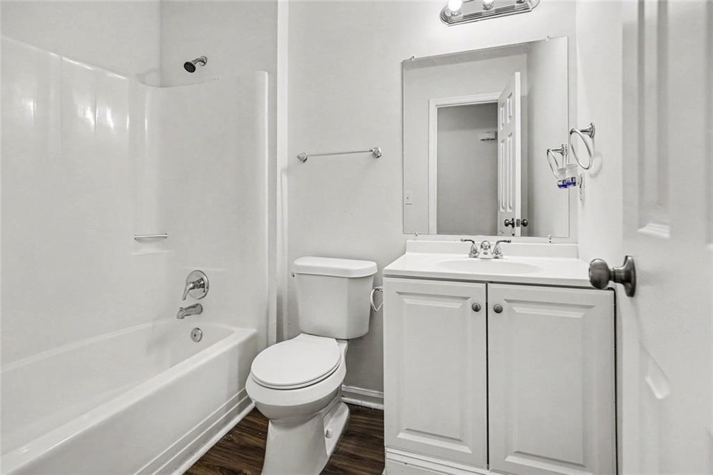 19 Thomas Way Newnan, GA 30263 - Photo 7 of 15 a bathroom with a sink toilet and shower