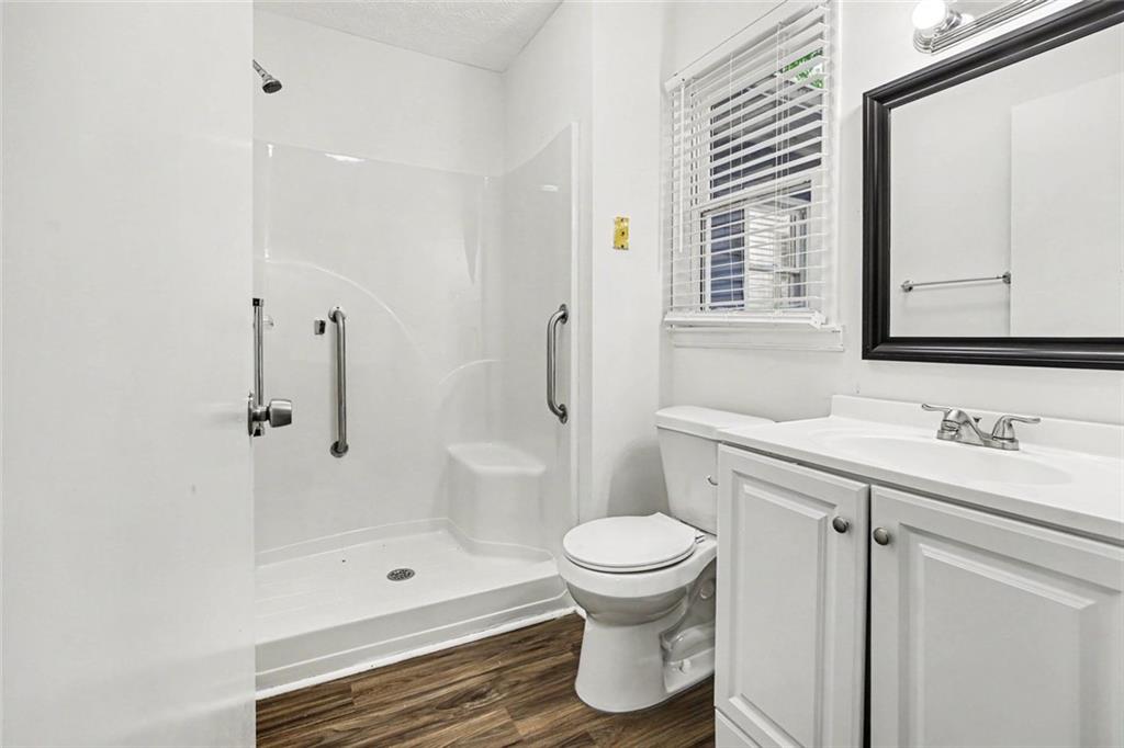 19 Thomas Way Newnan, GA 30263 - Photo 9 of 15 a bathroom with a sink toilet and shower