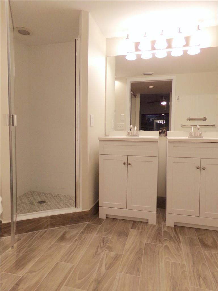 8205 Boca Rio Drive, Unit 8205 Boca Raton, FL 33433 - Photo 6 of 17 a view of a sink and a mirror
