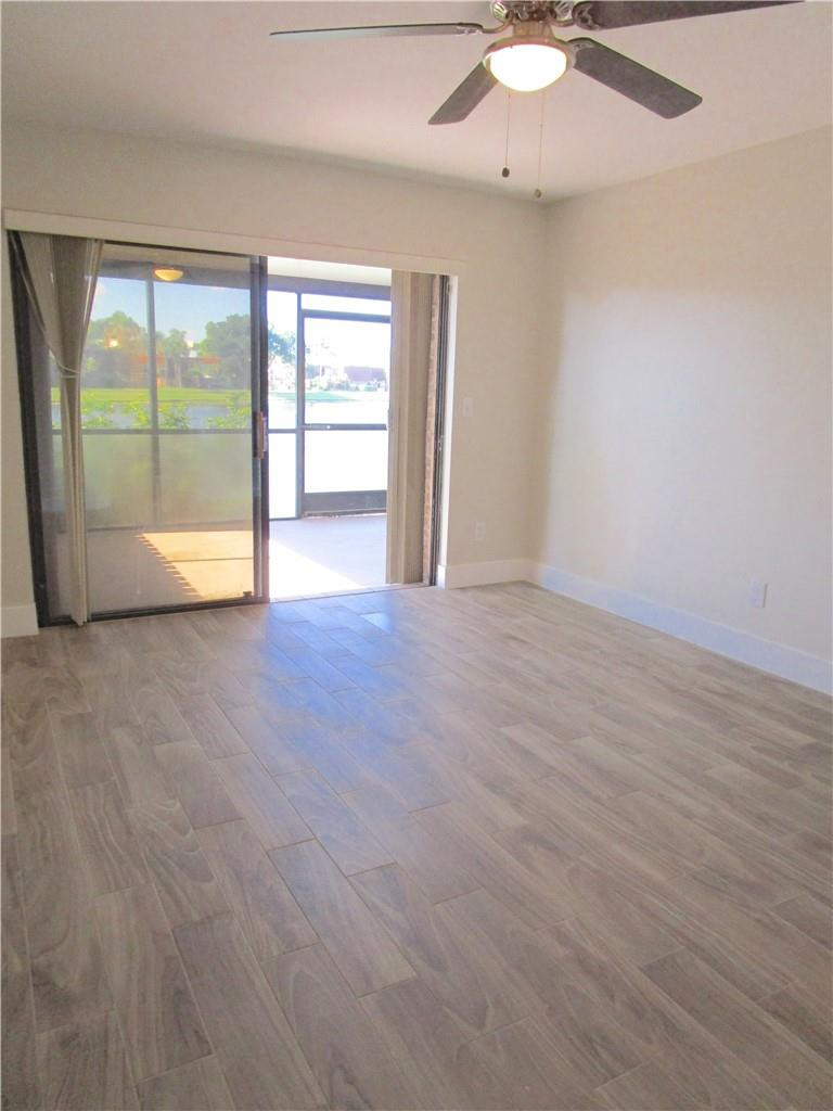 8205 Boca Rio Drive, Unit 8205 Boca Raton, FL 33433 - Photo 8 of 17 a view of an empty room with a window