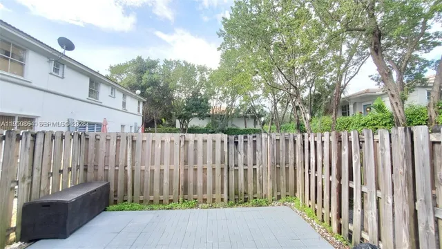 a view of a wooden fence