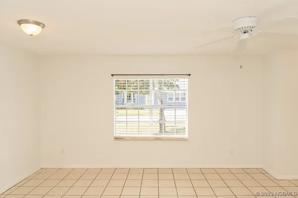 a view of an empty room with window