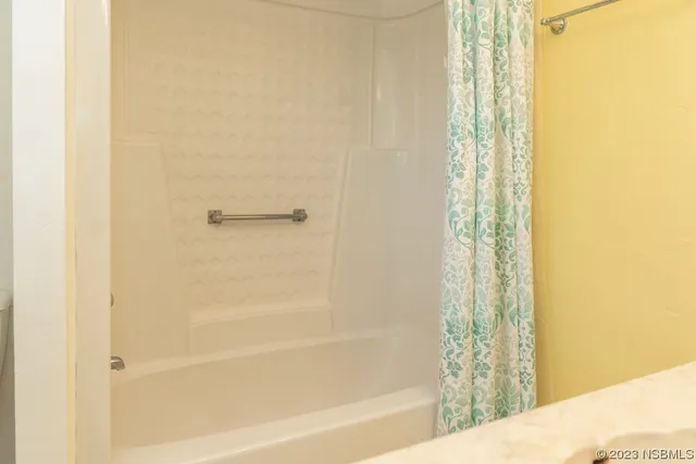 a bathroom with a bathtub