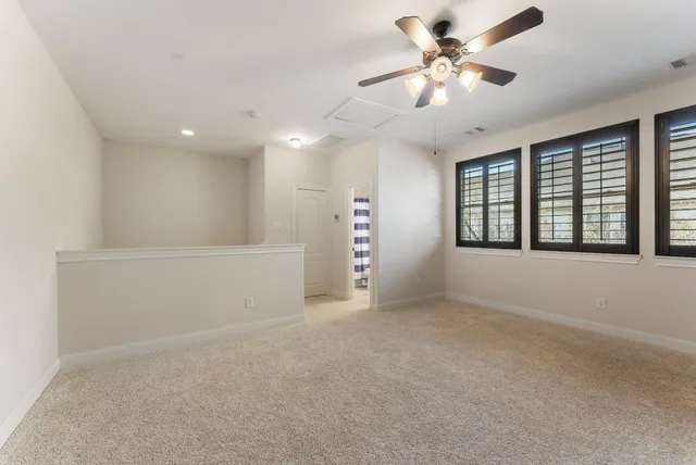 a view of outdoor space with seating area and trees around