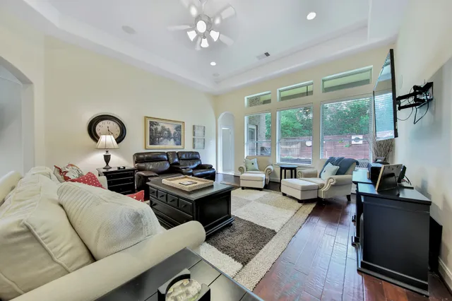 a view of a dining room with furniture and window