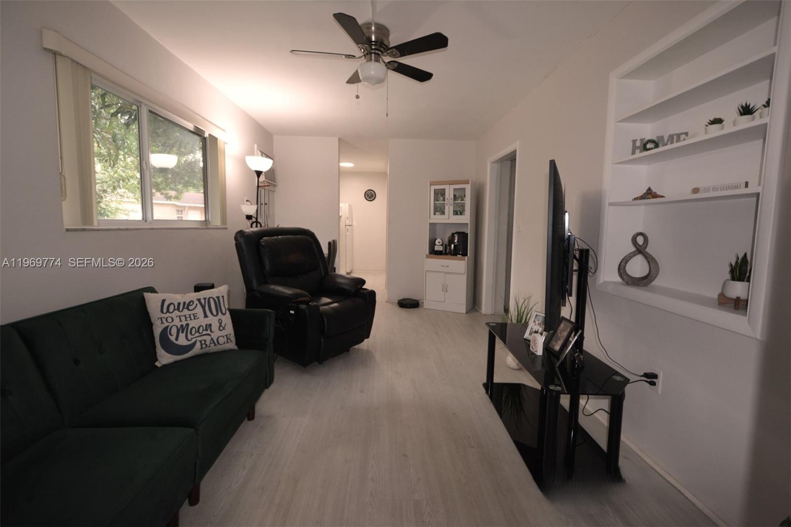 890 East 38th Street Hialeah, FL 33013 - Photo 24 of 30 a living room with furniture