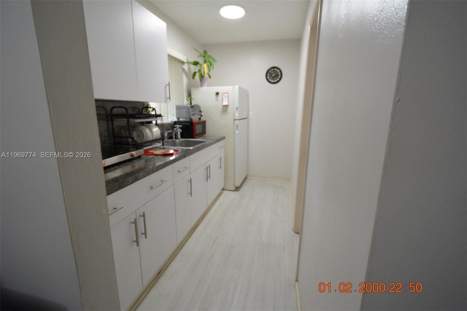 890 East 38th Street Hialeah, FL 33013 - Photo 28 of 30 a kitchen with stainless steel appliances a refrigerator and a stove