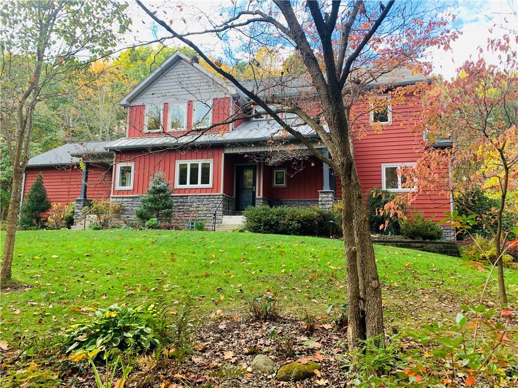 232 Devils Backbone Road New Castle, PA 16102 - Photo 2 of 25 a front view of a house with garden