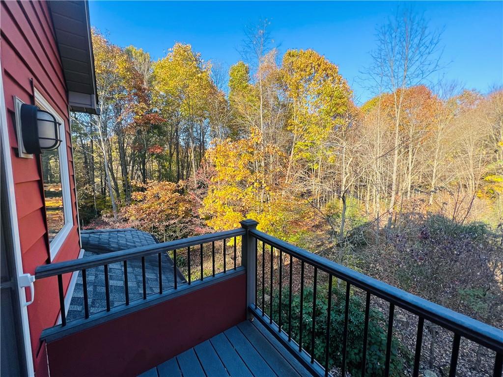 232 Devils Backbone Road New Castle, PA 16102 - Photo 18 of 25 a view of a balcony with wooden fence