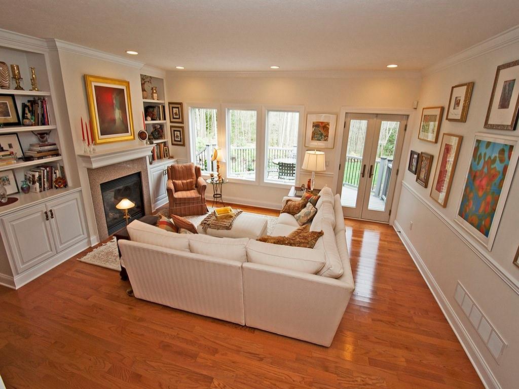 232 Devils Backbone Road New Castle, PA 16102 - Photo 9 of 25 a living room with fireplace furniture and a wooden floor