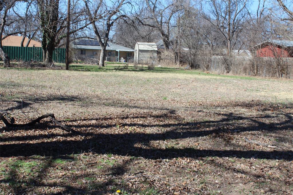 220 Rusk Street Clyde, TX 79510 - Photo 3 of 11 a view of a house with a yard