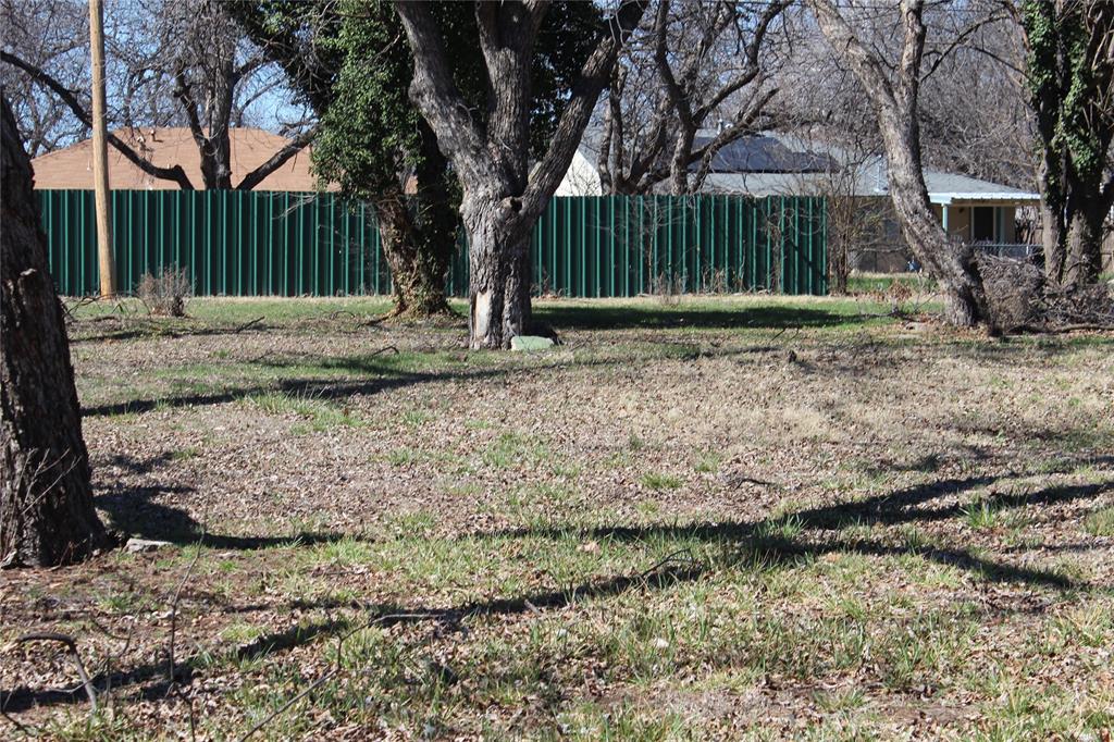 220 Rusk Street Clyde, TX 79510 - Photo 10 of 11 a view of backyard of house with green space