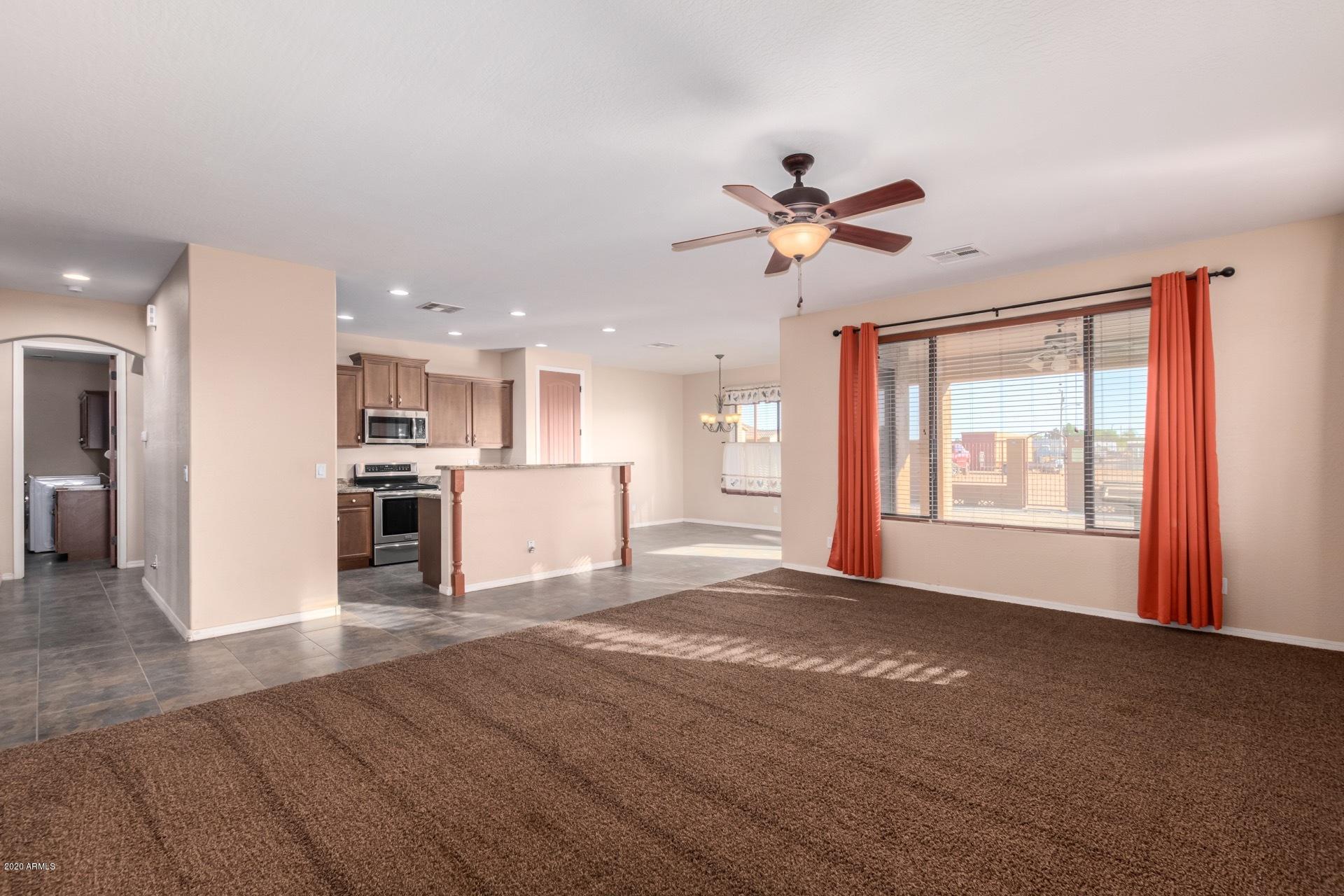 20655 West Telegram Path Road Buckeye, AZ 85326 - Photo 9 of 64 great room kitchen