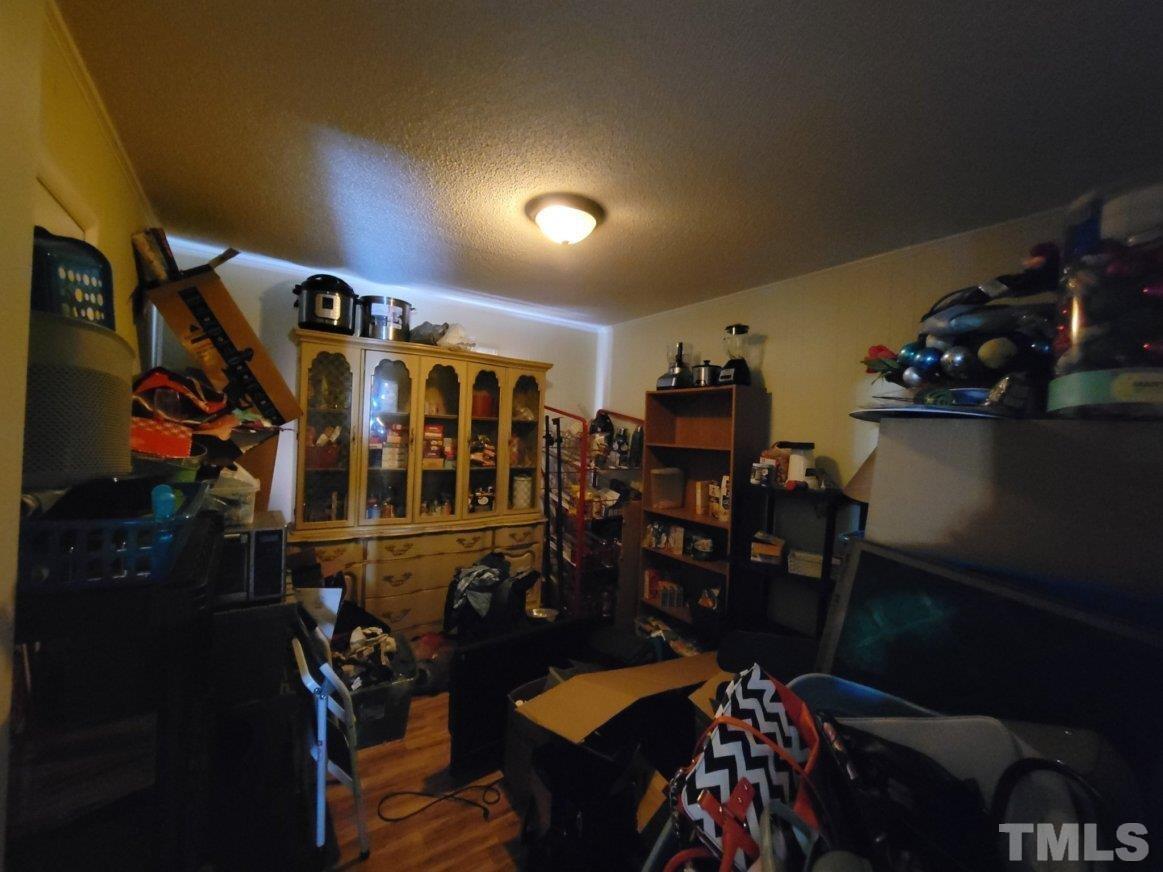 3336 Fairground Road Dunn, NC 28334 - Photo 5 of 11 a view of a room with gym equipment
