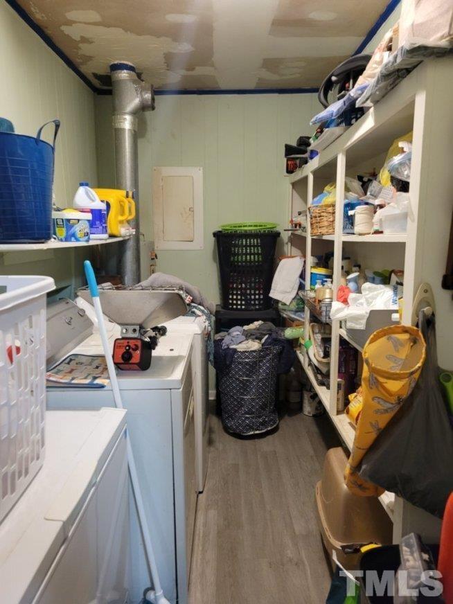 3336 Fairground Road Dunn, NC 28334 - Photo 8 of 11 a room with storage and utility