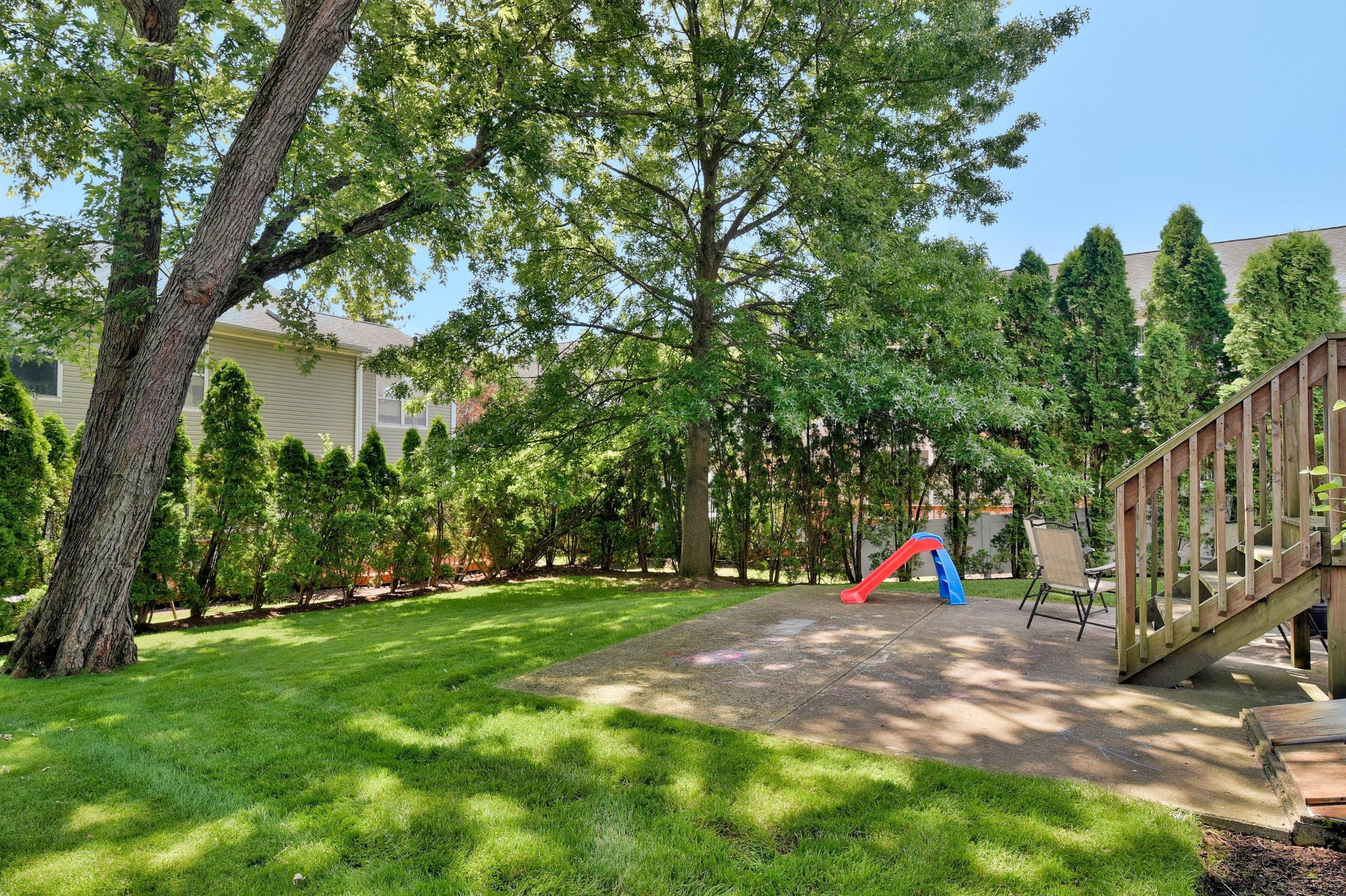 168 Colonial Road, Unit 10 Stamford, CT 06906 - Photo 22 of 27 a view of outdoor space with deck and trees