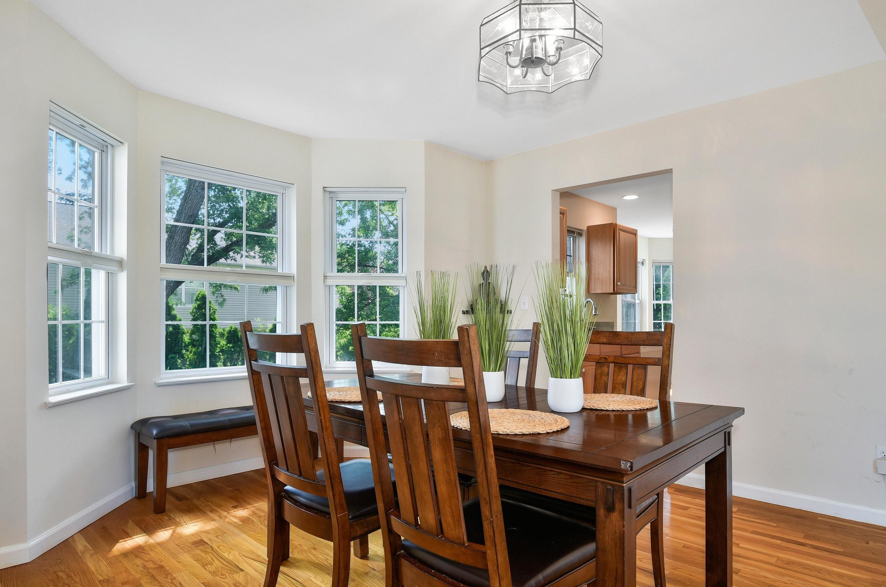 168 Colonial Road, Unit 10 Stamford, CT 06906 - Photo 8 of 27 a view of a dining room with furniture window and outside view
