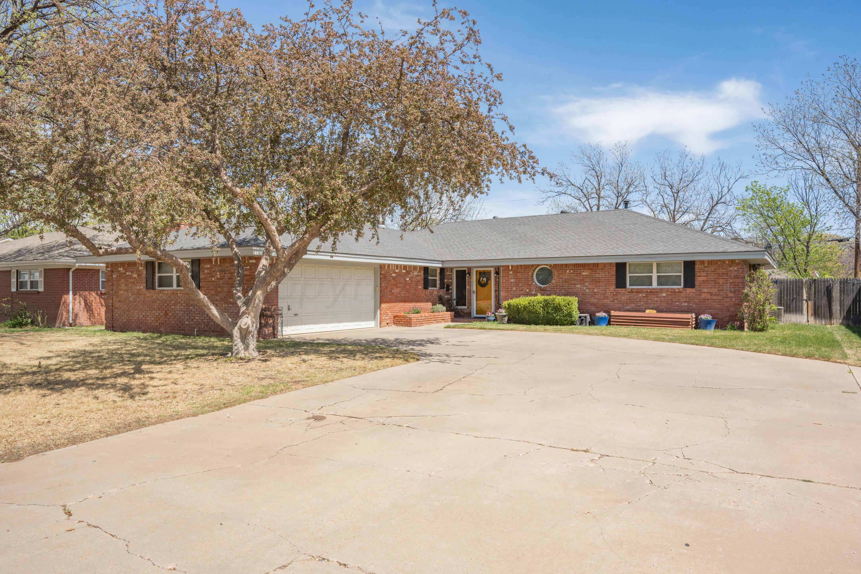 3313 Bedford Road Amarillo, TX 79106 - Photo 1 of 24 a house with outdoor space