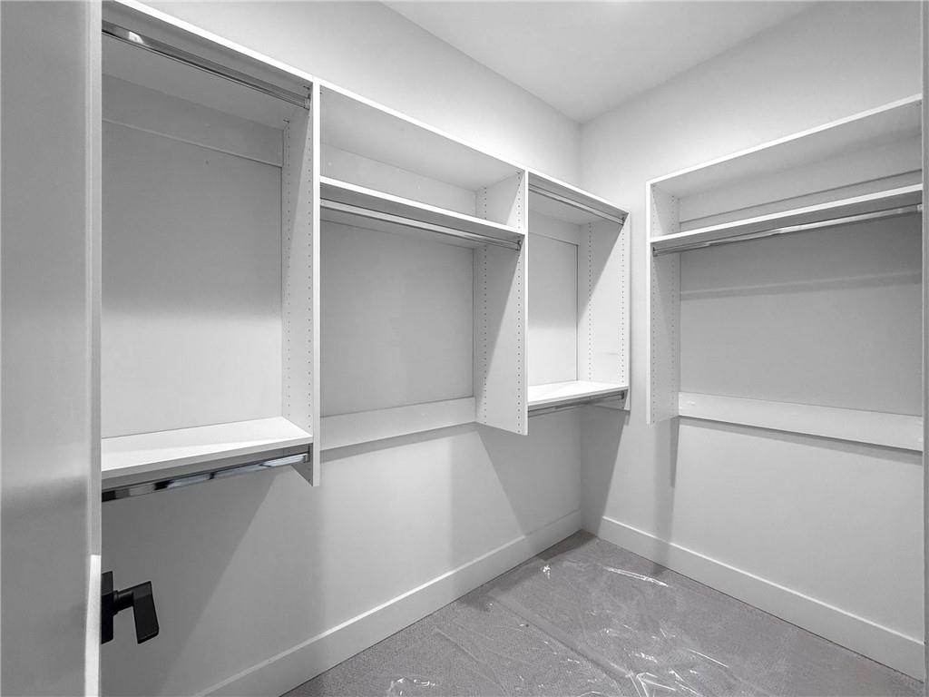 345 Sugarview Road Sugar Hill, GA 30518 - Photo 40 of 66 a view of an empty walk in closet