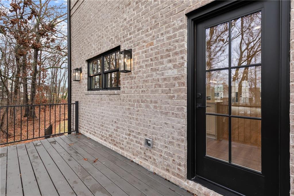 345 Sugarview Road Sugar Hill, GA 30518 - Photo 50 of 66 a view of a door and wooden floor
